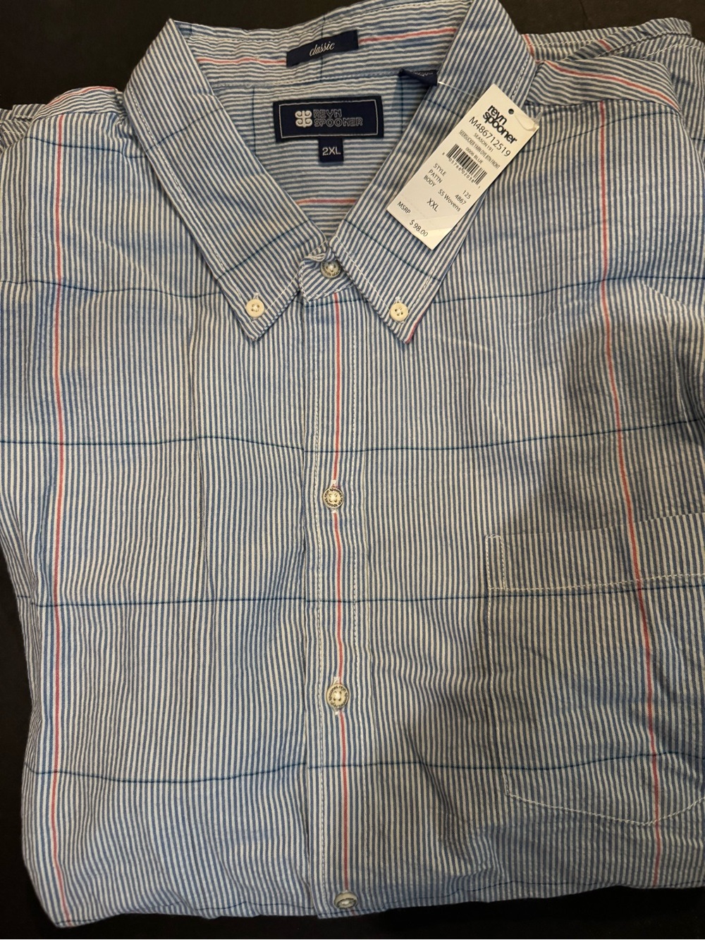 Reyn Spooner blue and white seer sucker shirt with red accent stripes.